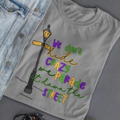 Hustle & Heart NC Bourbon Street We Don't Hide Crazy We Parade It Around Mardi Gras Graphic Tee