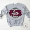 Hustle & Heart NC Faux Glitter Leopard Circle Designs Aces Grey Leopard Circle Graphic Tee