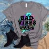 Hustle And Heart NC Bad Vibes Don't Go With My Outfit Graphic Tee Neon Mascots