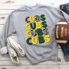 Hustle & Heart NC Cubs Dark Green/yellow Repeating Mascot Graphic Tee Customizable Name Tees