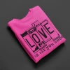Hustle & Heart NC For Love Is All You Need License Plate Pink And Black Valentine's Day Graphic Tee
