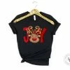 Hustle & Heart NC JOY Red Reindeer With Bow Christmas Graphic Tee