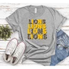 Hustle & Heart NC Lions Yellow Repeating Graphic Tee