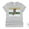 Hustle And Heart NC Lightning Bolt Designs Seahawks Green Lightning Bolt Graphic Tee